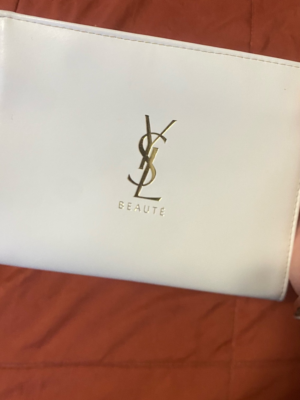 Yves Saint Laurent White Cosmetic Pouch with Gold Logo